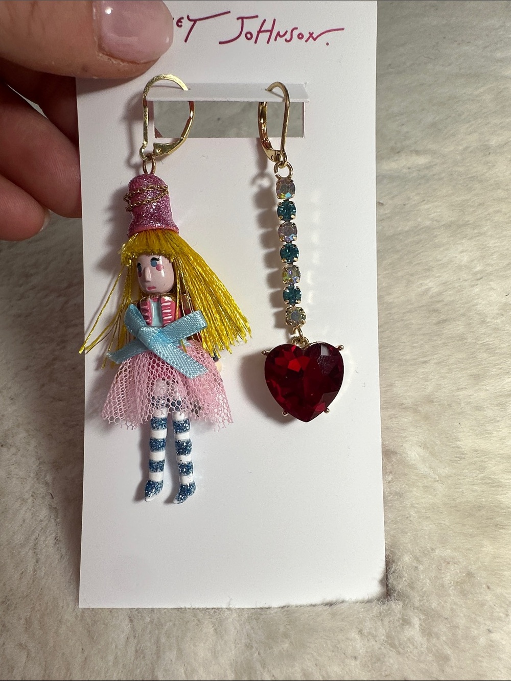 Betsey Johnson mismatched nutcracker and rhinestone heart dangle earrings